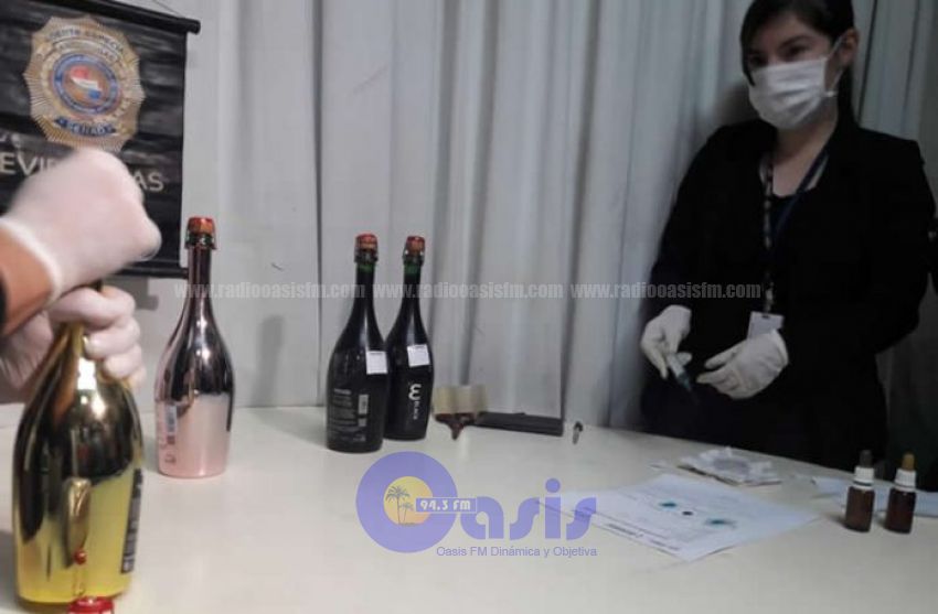 Intentaron enviar cocaína líquida en botellas de champange